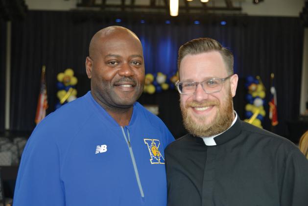 Tyus Doctor and Fr. Anthony McFarland