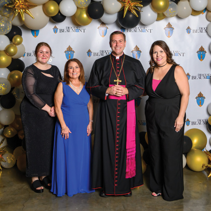 Regan Ryan, Cindy Lockwood, Bishop David Toups and Rachel Johnson
