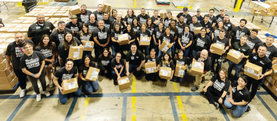 H-E-B mployees resenting service member care packages