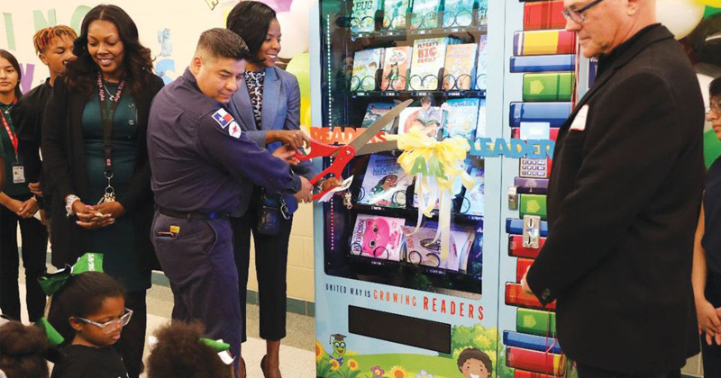 School celebrates ribbon cutting of book vending machine