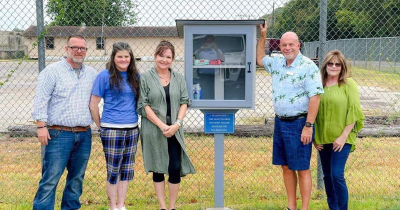 (Right of the box) Al Granger, owner of Granger Chevrolet and Mayor Pro-Tempore Meritta Kennedy share the unveiling of West Orange’s newest blessing box with Michael and Meritte Dawn Norwood and Kellie Bishop Riley (pictured left). First Presbyterian Church of Orange donated the second blessing box was unveiled at Alford-Seale Plaza.