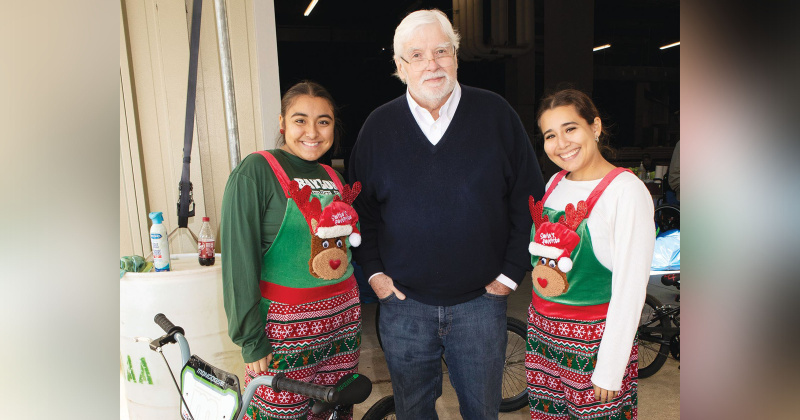 Wayne A. Reaud works alongside volunteers to ensure bicycles and Bibles make their way into the hands of Southeast Texas children in time for Christmas.