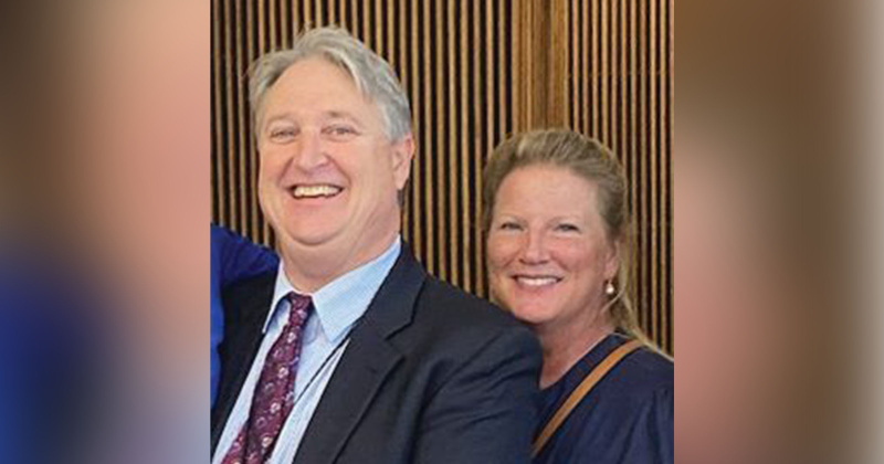 Former County Auditor Patrick Swain celebrates retirement alongside his wife Donna during a Dec. 12 reception.