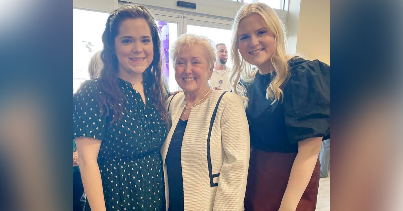 Gisela Houseman with her granddaughters, Emily (left) and Samantha (right), at celebration