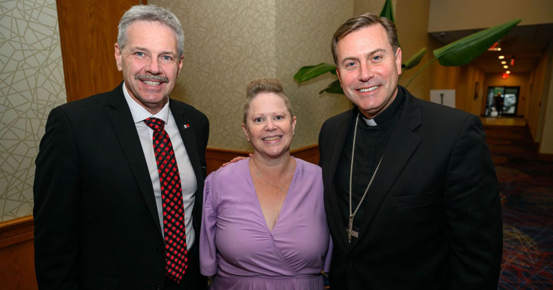 Jaime and Stacy Taylor, Bishop David Toups