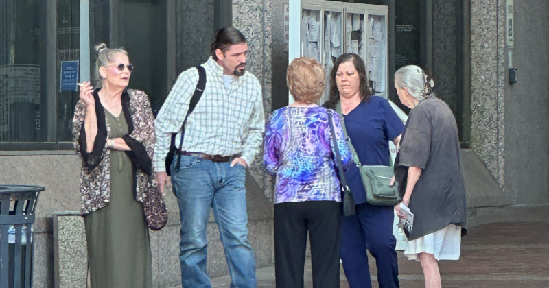 Daniel Leblanc, his wife, Mandi, and supporters stand after appearing in court Aug. 21 outside the Jefferson County courthouse