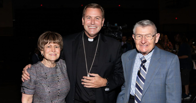 Regina Rogers, Bishop David Toups and Mark Kubala
