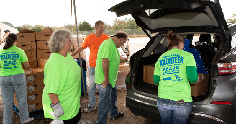 Christmas turkeys and complete meals are gifted to each of the 1,000 families, courtesy of the Wayne A. Reaud family.