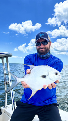 Moore with a beautiful permit caught while fishing in Florida’s Biscayne Bay. His travels and connections with wildlife organizations and agencies, give him a huge source of contacts for in-depth outdoors articles.