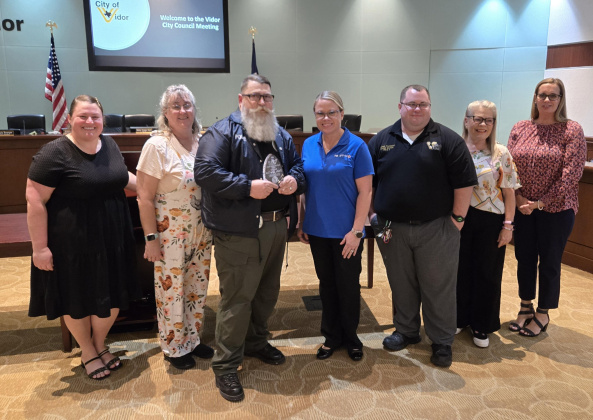 Pictured, left to right, Council members Mikayla Bourque and Debra Gatlin, Det. Jeffrey Court, Mayor Misty Songe Hart, Council members Michael Thompson, Kelly Carder and Jessica Barker