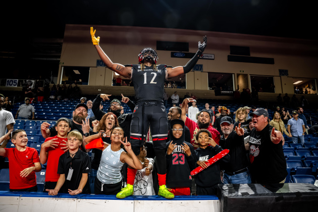 Carl Robinson III celebrates with the fans as the Beaumont Renagades win the NAL Championship (Photo by Chad Cooper)