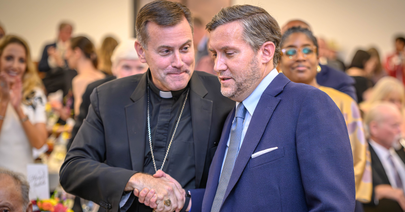 Bishop David Toups and Reagan Reaud