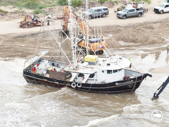 May 27, the GLO takes an aerial image of a trapped 56’ shrimp boat being removed from Crystal Beach.